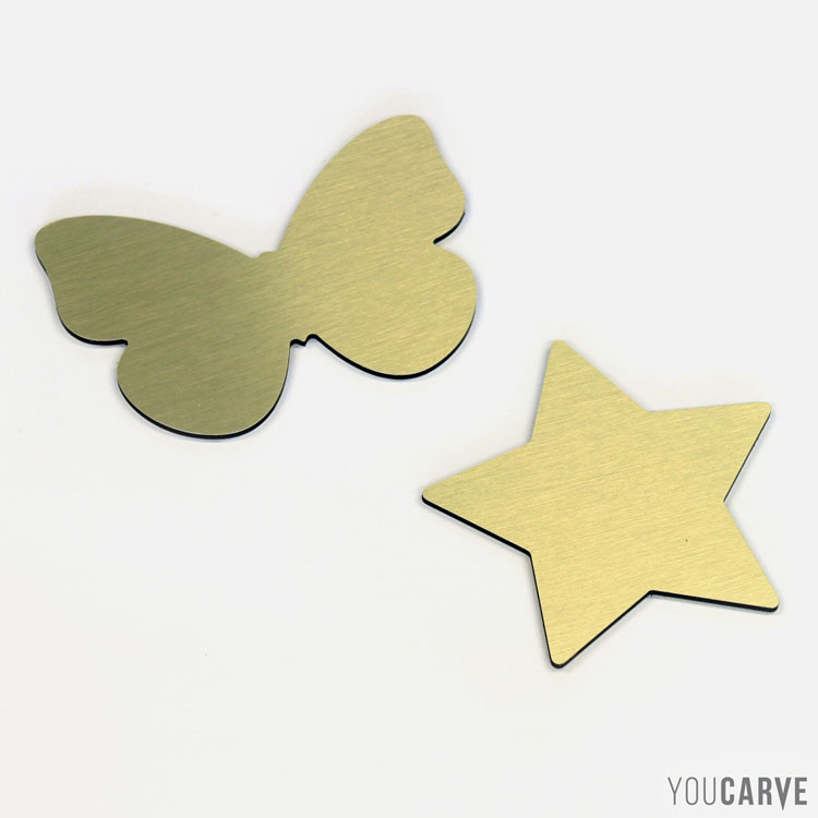Silhouettes/formes de papillon et d'étoile découpées en composite aluminium brossé doré